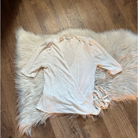 REFORMATION Rosebud Ribbed Wrap Top In Ivory - Picture 4 of 7